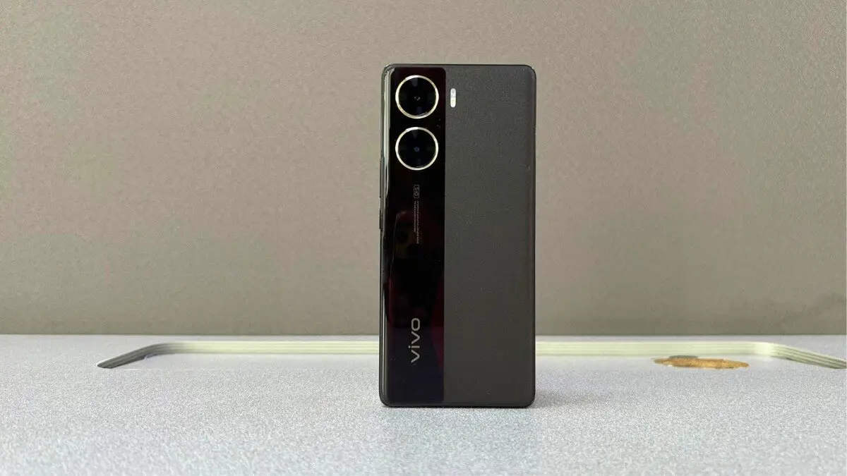 a black rectangular device with two cameras